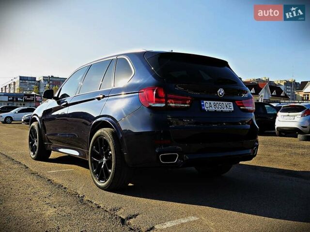 Синій БМВ Х5, об'ємом двигуна 3 л та пробігом 133 тис. км за 29950 $, фото 4 на Automoto.ua