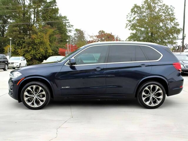 Синий БМВ Х5, объемом двигателя 3 л и пробегом 58 тыс. км за 17300 $, фото 3 на Automoto.ua