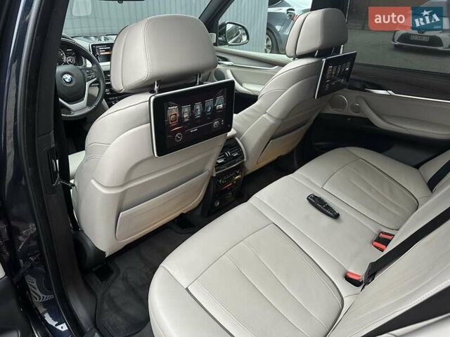 Синий БМВ Х5, объемом двигателя 2 л и пробегом 151 тыс. км за 32900 $, фото 39 на Automoto.ua