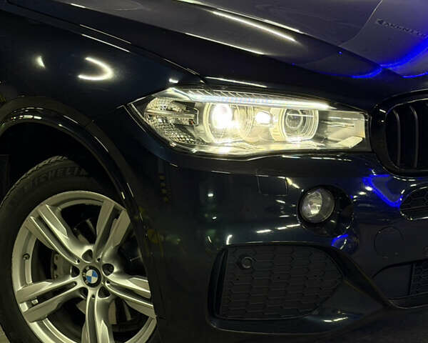 Синий БМВ Х5, объемом двигателя 2 л и пробегом 120 тыс. км за 36500 $, фото 3 на Automoto.ua