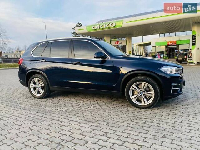 Синий БМВ Х5, объемом двигателя 2 л и пробегом 80 тыс. км за 35950 $, фото 4 на Automoto.ua