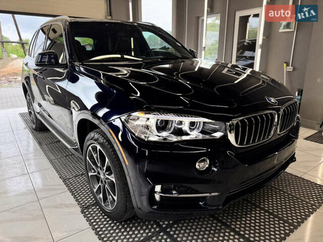 Синий БМВ Х5, объемом двигателя 2.98 л и пробегом 38 тыс. км за 34000 $, фото 3 на Automoto.ua