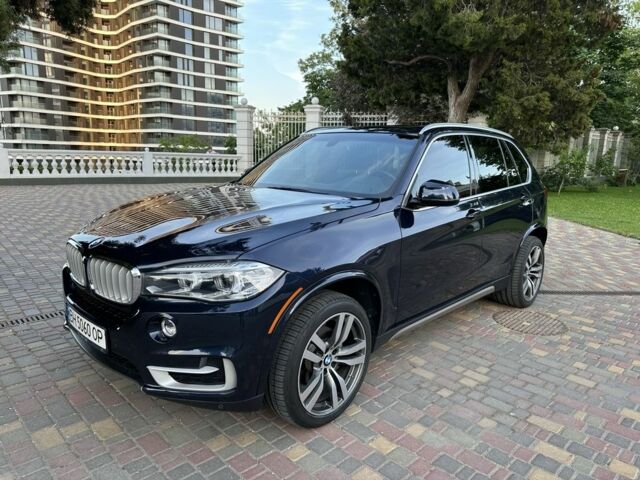 Синий БМВ Х5, объемом двигателя 3 л и пробегом 74 тыс. км за 31500 $, фото 1 на Automoto.ua