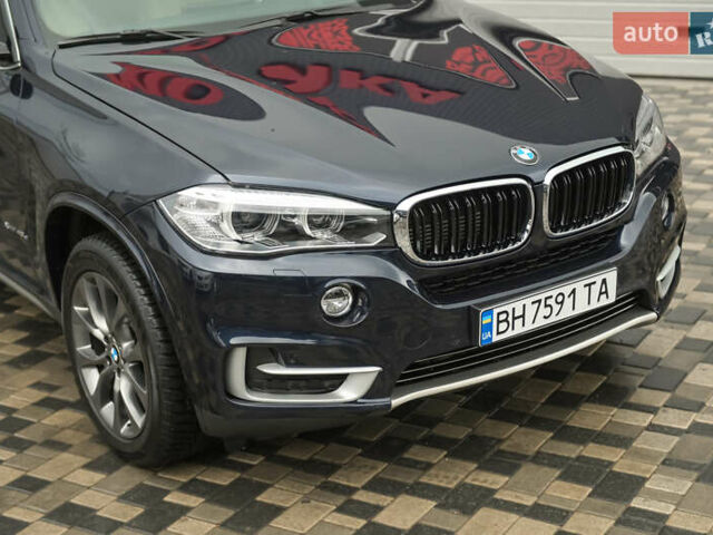 Синий БМВ Х5, объемом двигателя 2 л и пробегом 92 тыс. км за 36500 $, фото 1 на Automoto.ua