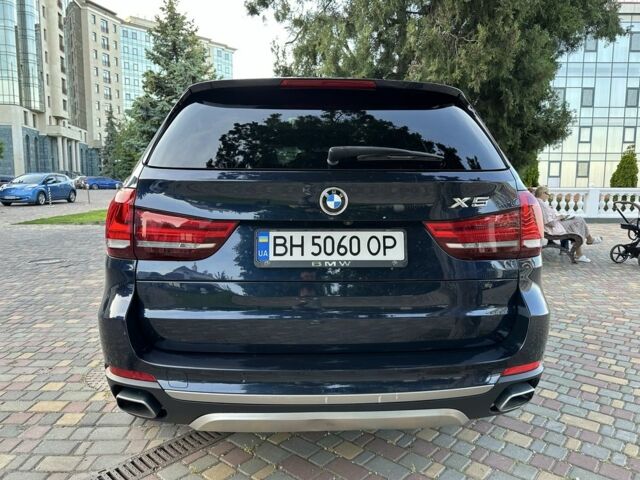 Синий БМВ Х5, объемом двигателя 3 л и пробегом 74 тыс. км за 31500 $, фото 3 на Automoto.ua