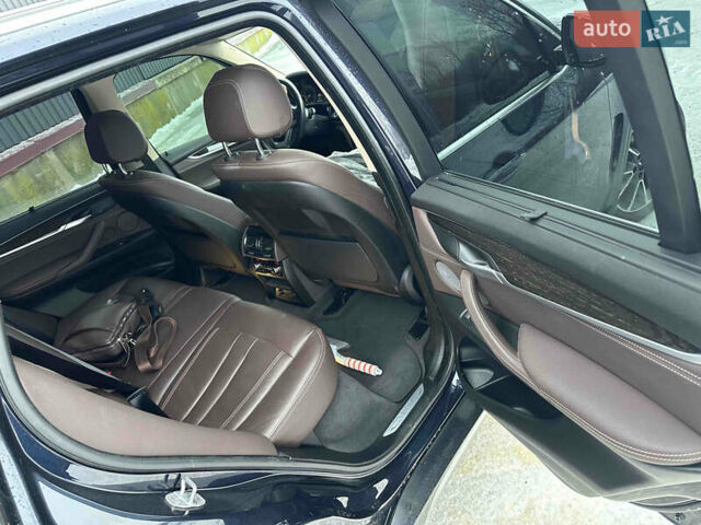 Синий БМВ Х5, объемом двигателя 2.99 л и пробегом 130 тыс. км за 38000 $, фото 5 на Automoto.ua