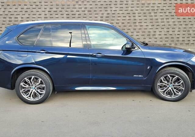 Синий БМВ Х5, объемом двигателя 2 л и пробегом 99 тыс. км за 32500 $, фото 30 на Automoto.ua
