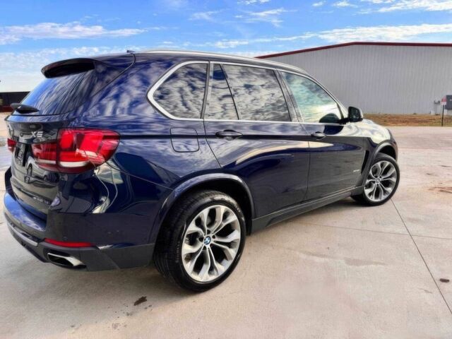 Синий БМВ Х5, объемом двигателя 3 л и пробегом 45 тыс. км за 5500 $, фото 4 на Automoto.ua