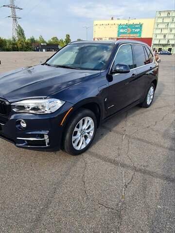 Синий БМВ Х5, объемом двигателя 2 л и пробегом 54 тыс. км за 37300 $, фото 32 на Automoto.ua