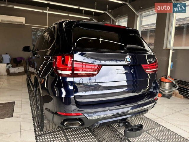 Синий БМВ Х5, объемом двигателя 2.98 л и пробегом 38 тыс. км за 34000 $, фото 5 на Automoto.ua
