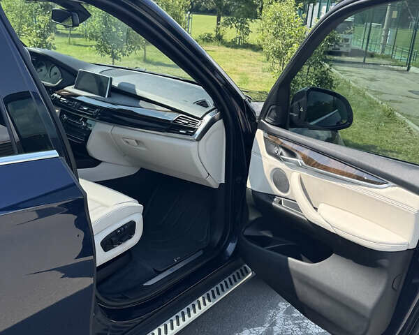 Синій БМВ Х5, об'ємом двигуна 2 л та пробігом 187 тис. км за 34000 $, фото 18 на Automoto.ua