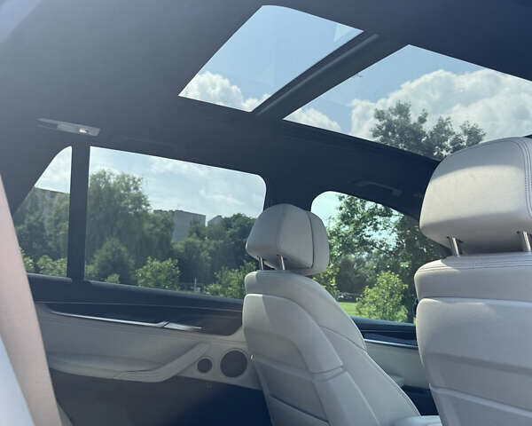 Синій БМВ Х5, об'ємом двигуна 2 л та пробігом 187 тис. км за 34000 $, фото 19 на Automoto.ua