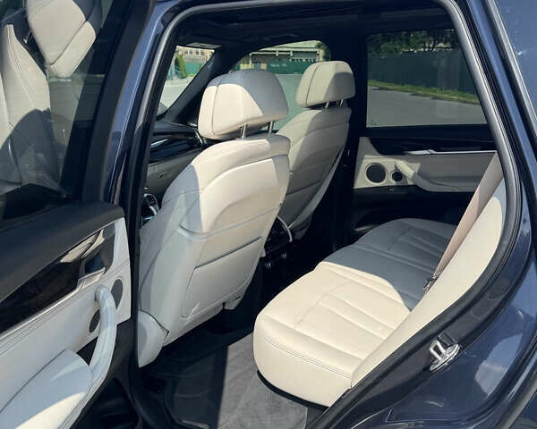 Синій БМВ Х5, об'ємом двигуна 2 л та пробігом 187 тис. км за 34000 $, фото 27 на Automoto.ua