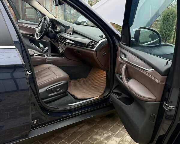 Синій БМВ Х5, об'ємом двигуна 2 л та пробігом 66 тис. км за 39500 $, фото 6 на Automoto.ua