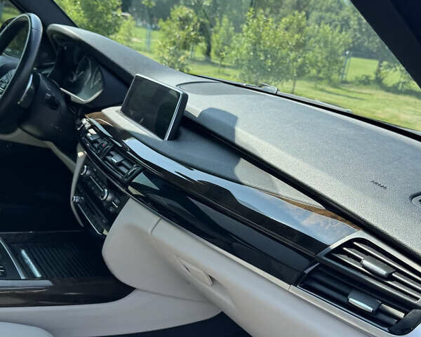 Синій БМВ Х5, об'ємом двигуна 2 л та пробігом 187 тис. км за 34000 $, фото 14 на Automoto.ua