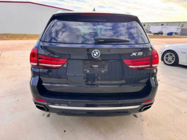 Синий БМВ Х5, объемом двигателя 3 л и пробегом 45 тыс. км за 5500 $, фото 5 на Automoto.ua