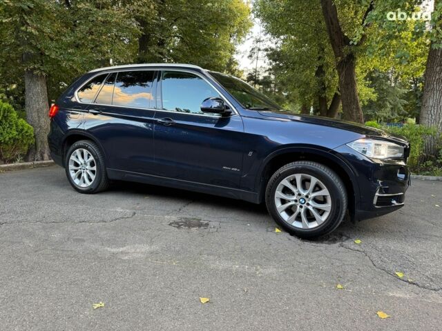 Синій БМВ Х5, об'ємом двигуна 2 л та пробігом 71 тис. км за 37440 $, фото 4 на Automoto.ua