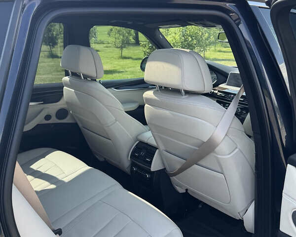 Синій БМВ Х5, об'ємом двигуна 2 л та пробігом 187 тис. км за 34000 $, фото 21 на Automoto.ua