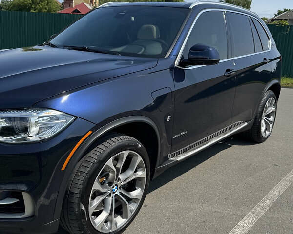 Синій БМВ Х5, об'ємом двигуна 2 л та пробігом 187 тис. км за 34000 $, фото 4 на Automoto.ua