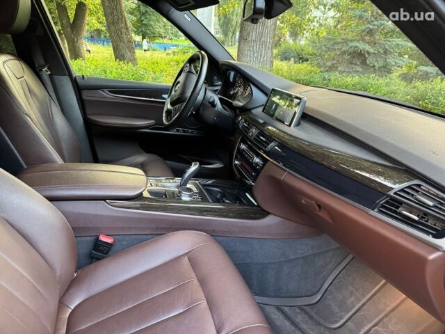 Синій БМВ Х5, об'ємом двигуна 2 л та пробігом 71 тис. км за 37440 $, фото 33 на Automoto.ua