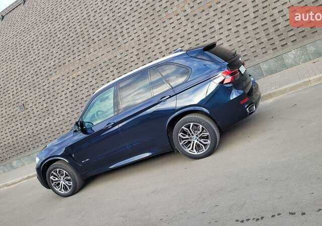 Синий БМВ Х5, объемом двигателя 2 л и пробегом 99 тыс. км за 32500 $, фото 45 на Automoto.ua