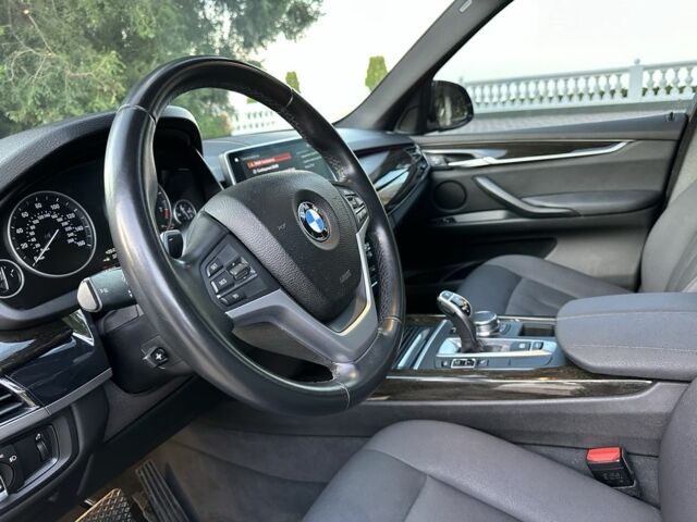 Синий БМВ Х5, объемом двигателя 3 л и пробегом 74 тыс. км за 31500 $, фото 2 на Automoto.ua