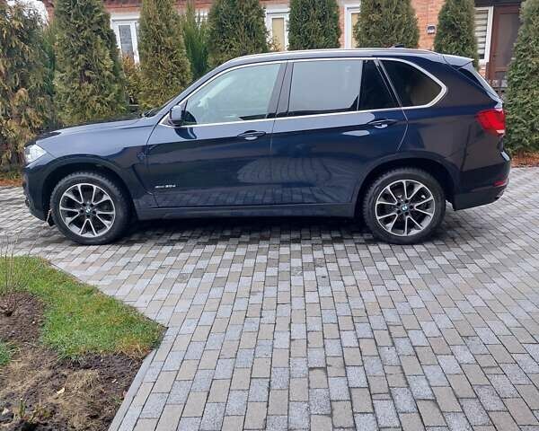 Синій БМВ Х5, об'ємом двигуна 2.99 л та пробігом 99 тис. км за 49700 $, фото 2 на Automoto.ua