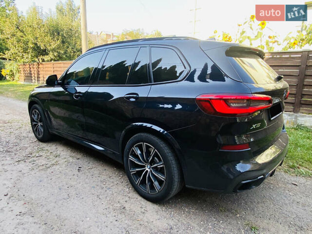 Синий БМВ Х5, объемом двигателя 3 л и пробегом 213 тыс. км за 41500 $, фото 2 на Automoto.ua