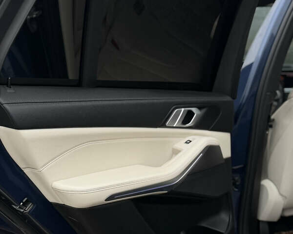 Синій БМВ Х5, об'ємом двигуна 3 л та пробігом 57 тис. км за 59999 $, фото 42 на Automoto.ua