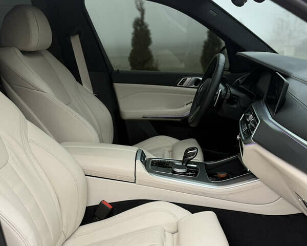 Синій БМВ Х5, об'ємом двигуна 3 л та пробігом 57 тис. км за 59999 $, фото 34 на Automoto.ua