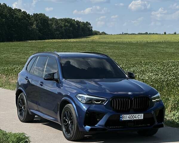 Синий БМВ Х5, объемом двигателя 3 л и пробегом 70 тыс. км за 48799 $, фото 1 на Automoto.ua