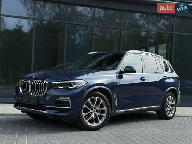 Синий БМВ Х5, объемом двигателя 3 л и пробегом 138 тыс. км за 45900 $, фото 1 на Automoto.ua