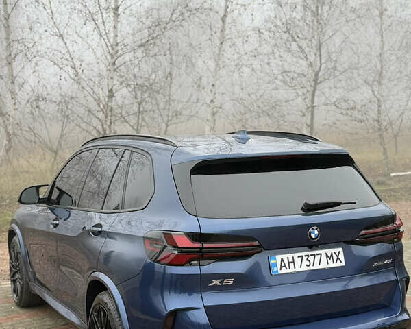 Синій БМВ Х5, об'ємом двигуна 3 л та пробігом 57 тис. км за 59999 $, фото 10 на Automoto.ua