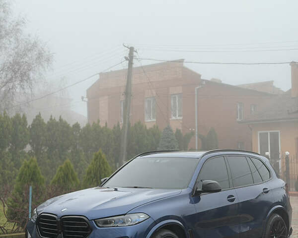 Синій БМВ Х5, об'ємом двигуна 3 л та пробігом 57 тис. км за 59999 $, фото 1 на Automoto.ua