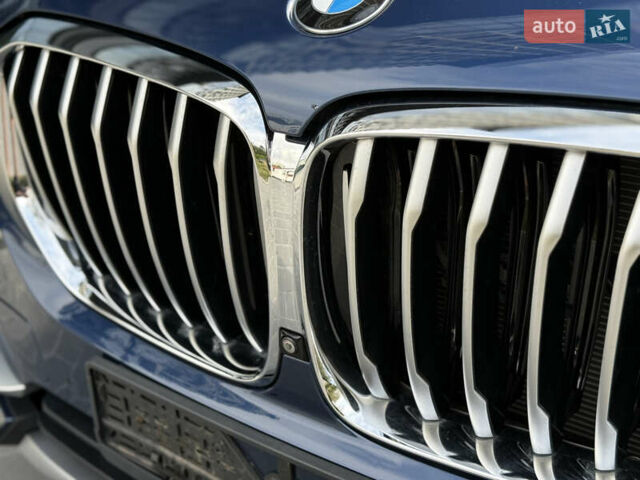 Синий БМВ Х5, объемом двигателя 3 л и пробегом 138 тыс. км за 45900 $, фото 4 на Automoto.ua