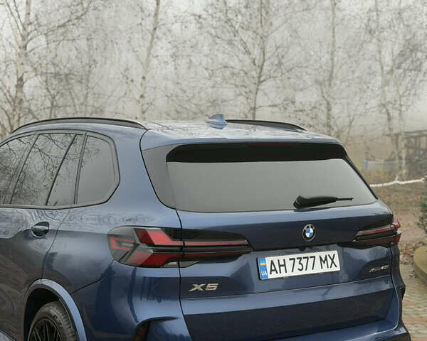 Синій БМВ Х5, об'ємом двигуна 3 л та пробігом 57 тис. км за 59999 $, фото 17 на Automoto.ua