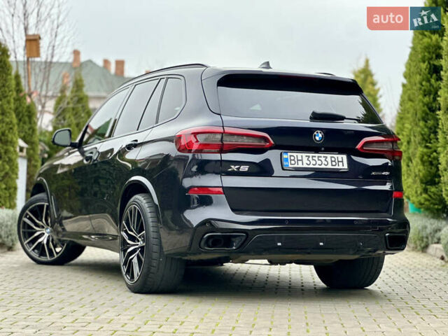 Синий БМВ Х5, объемом двигателя 3 л и пробегом 70 тыс. км за 51500 $, фото 3 на Automoto.ua