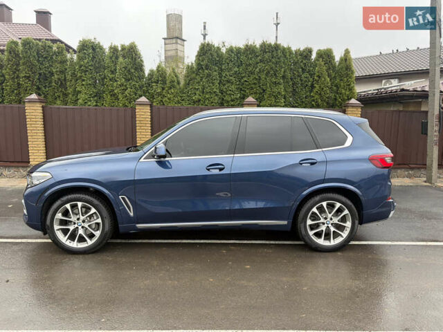 Синій БМВ Х5, об'ємом двигуна 3 л та пробігом 124 тис. км за 46000 $, фото 4 на Automoto.ua
