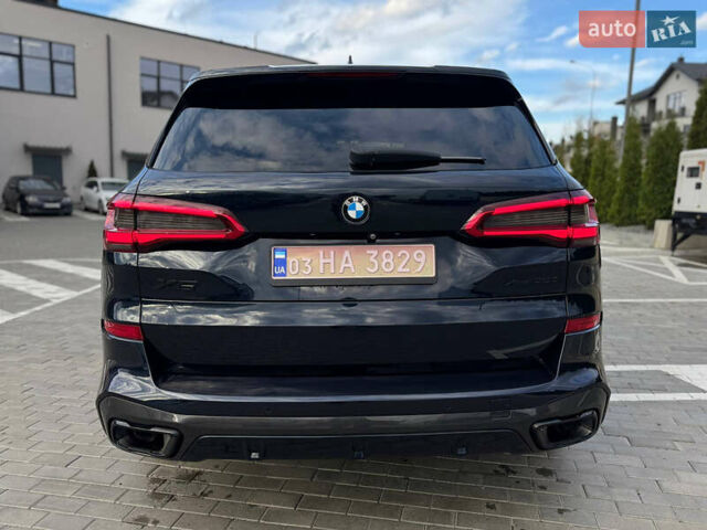 Синий БМВ Х5, объемом двигателя 3 л и пробегом 200 тыс. км за 49900 $, фото 3 на Automoto.ua