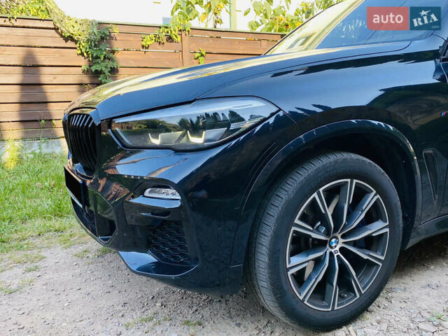 Синий БМВ Х5, объемом двигателя 3 л и пробегом 213 тыс. км за 41500 $, фото 1 на Automoto.ua