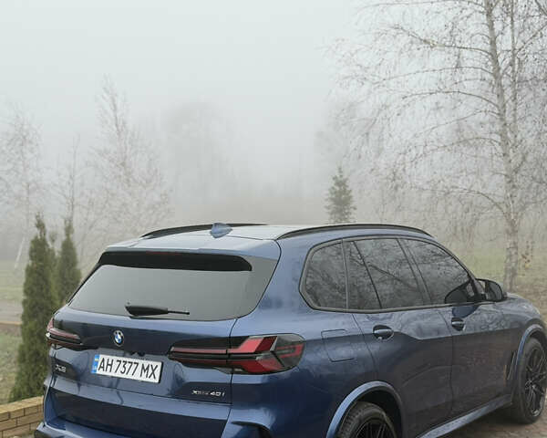 Синій БМВ Х5, об'ємом двигуна 3 л та пробігом 57 тис. км за 59999 $, фото 22 на Automoto.ua