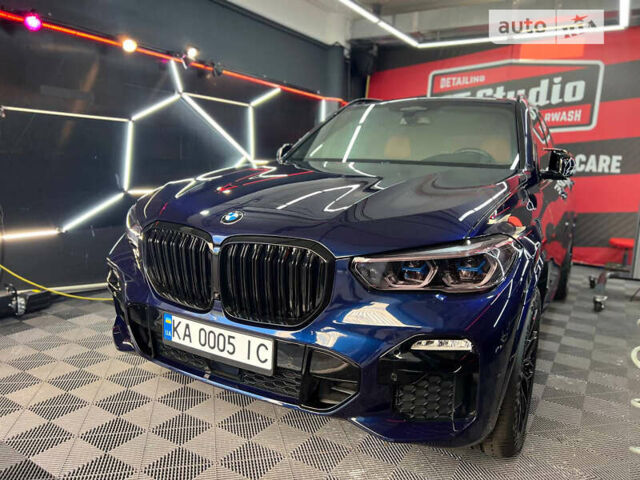 Синий БМВ Х5, объемом двигателя 3 л и пробегом 41 тыс. км за 69500 $, фото 1 на Automoto.ua