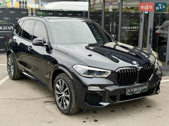 Синий БМВ Х5, объемом двигателя 3 л и пробегом 103 тыс. км за 55900 $, фото 3 на Automoto.ua