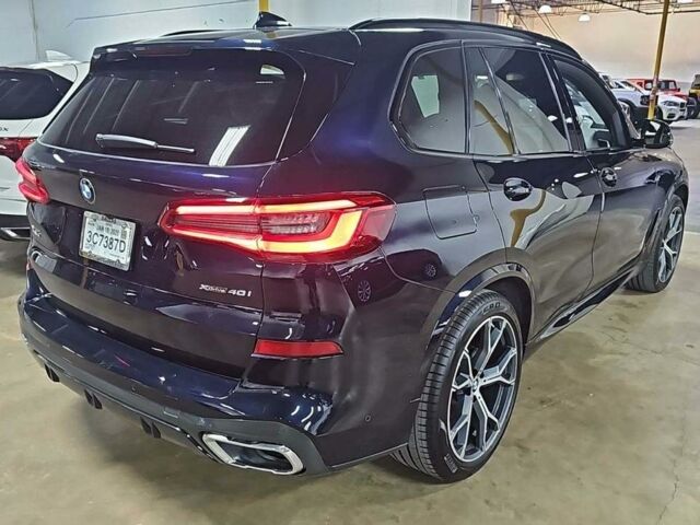 Синий БМВ Х5, объемом двигателя 3 л и пробегом 166 тыс. км за 41000 $, фото 3 на Automoto.ua