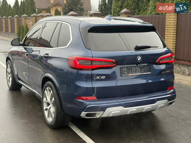 Синій БМВ Х5, об'ємом двигуна 3 л та пробігом 124 тис. км за 46000 $, фото 5 на Automoto.ua
