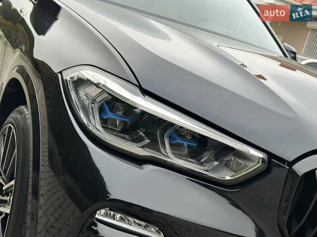 Синий БМВ Х5, объемом двигателя 3 л и пробегом 70 тыс. км за 51500 $, фото 21 на Automoto.ua