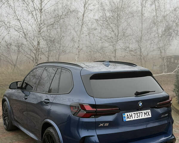 Синій БМВ Х5, об'ємом двигуна 3 л та пробігом 57 тис. км за 59999 $, фото 11 на Automoto.ua