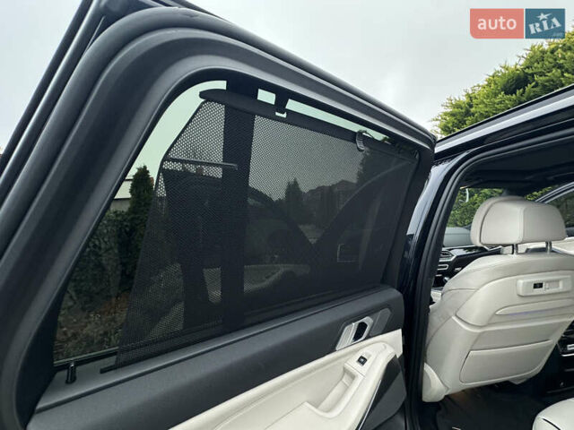 Синий БМВ Х5, объемом двигателя 3 л и пробегом 70 тыс. км за 51500 $, фото 43 на Automoto.ua