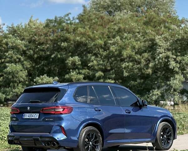 Синий БМВ Х5, объемом двигателя 3 л и пробегом 70 тыс. км за 48799 $, фото 3 на Automoto.ua