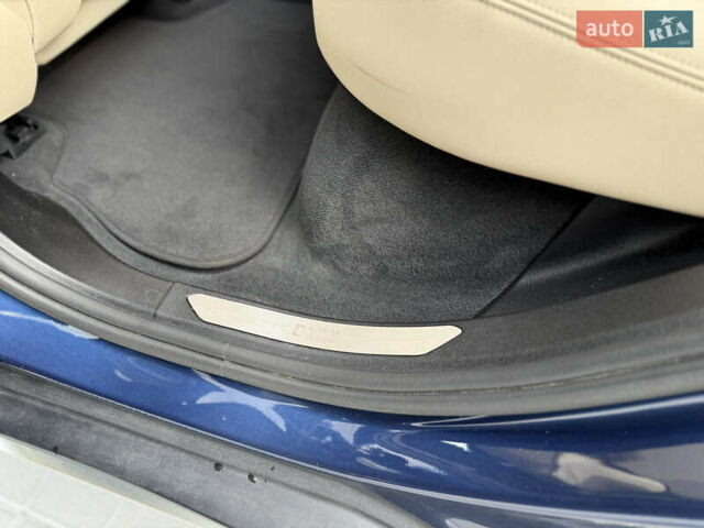 Синий БМВ Х5, объемом двигателя 3 л и пробегом 138 тыс. км за 45900 $, фото 62 на Automoto.ua